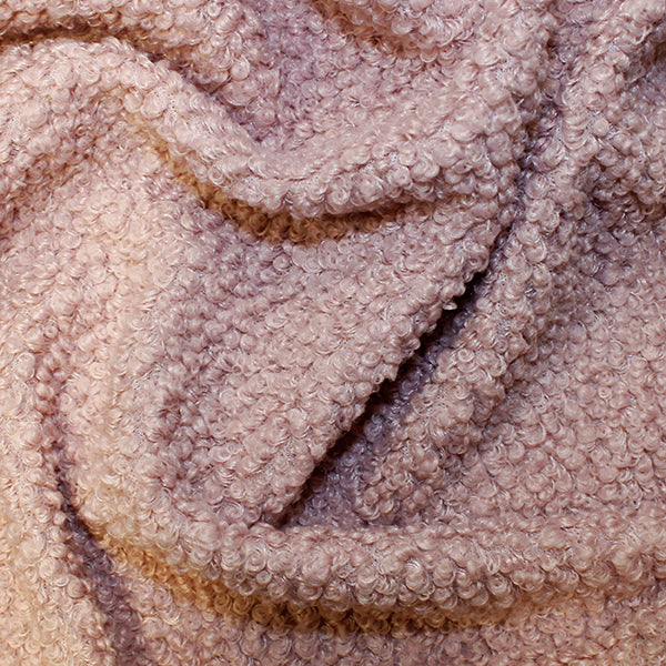Rose curly fleece fabric sample showing soft textured surface and looped finish