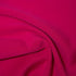 cerise scuba fabric 282gsm stretch knit with smooth handle and structured drape