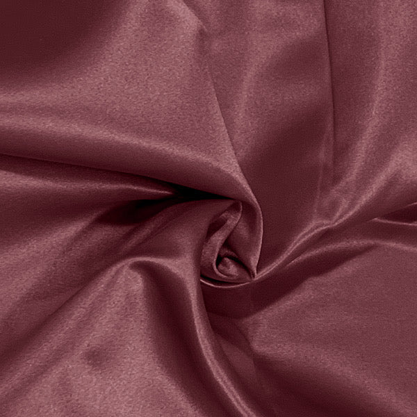 Rose duchess satin fabric folded to show sheen and smooth structured finish