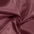 Rose duchess satin fabric folded to show sheen and smooth structured finish