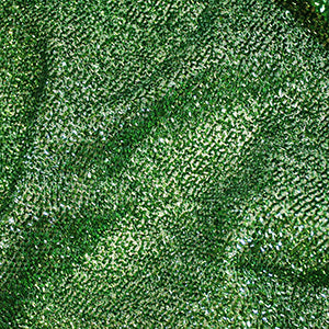 Green carnival tinsel fabric for costumes, stagewear, crafts and event décor