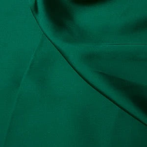 Jade silky satin fabric 85gsm lightweight woven polyester with a fluid drape