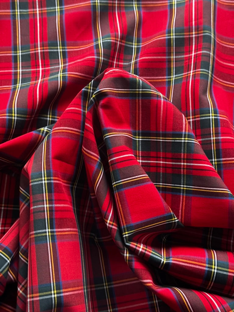 Red flat woven tartan cotton fabric with black, green, yellow and white check pattern