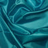 Turquoise polyester habotai fabric sample for checking colour, opacity and fabric feel