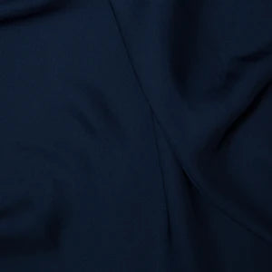 Teal scuba fabric 282gsm stretch knit with smooth handle and structured drape