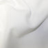Close-up of white tubular jersey fabric 95% cotton 5% elastane 250gsm showing soft stretch knit texture