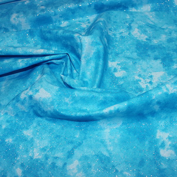 Turquoise cotton sparkle blender fabric with a subtle glitter effect